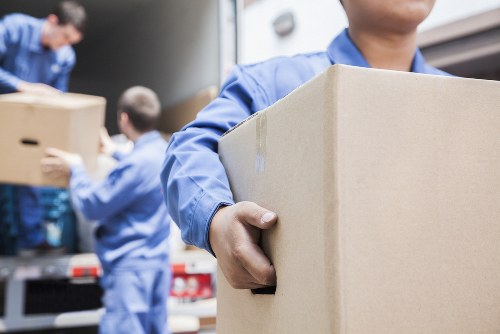 Office relocation planning in Leyton with moving boxes and workspace setup