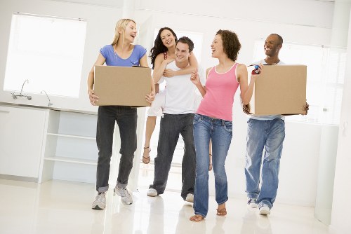 Professional removals team loading furniture for house removals in Leyton
