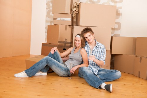Professional removals team planning a move in Leyton street