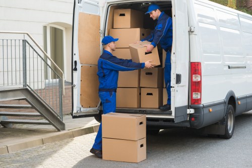 Man with a van in Leyton loading household furniture for a local move