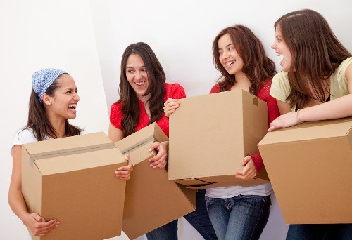 Professional moving truck in Leyton loaded with household furniture