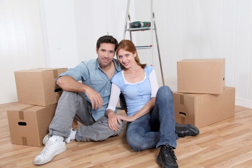 Boxes and furniture arranged for a small removal quote