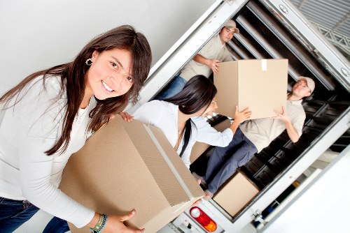 Commercial office furniture being loaded for relocation in East London