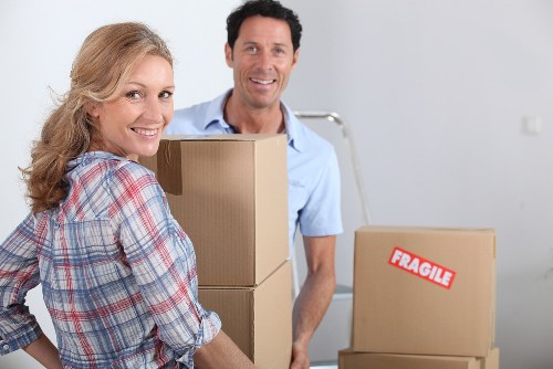Residential moving day setup with boxes and furniture for a Leyton house move