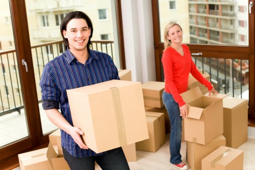 Boxes and furniture being moved from a London apartment