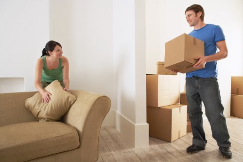 Commercial office relocation team handling desks and files in Leyton