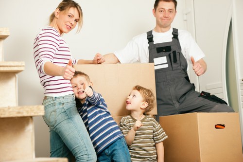 Packed moving boxes ready for transport by house removalists in Leyton