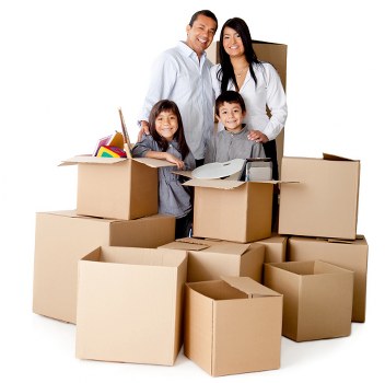 Mover carrying boxed household items during a Leyton relocation